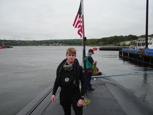 Jared S. Lyon in dive gear on submarine deck, U.S. Navy